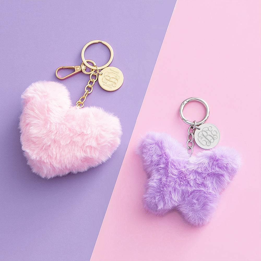 pink heart and purple butterfly fuzzy bag charm keychain flatlay