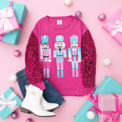 pink nutcracker sweatshirt flatlay