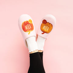 pink pumpkins slippers on girl on pink