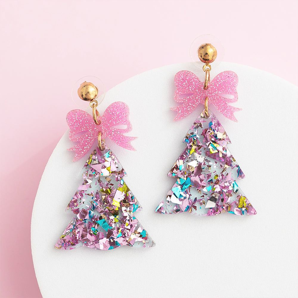 pink resin christmas trees on white dish
