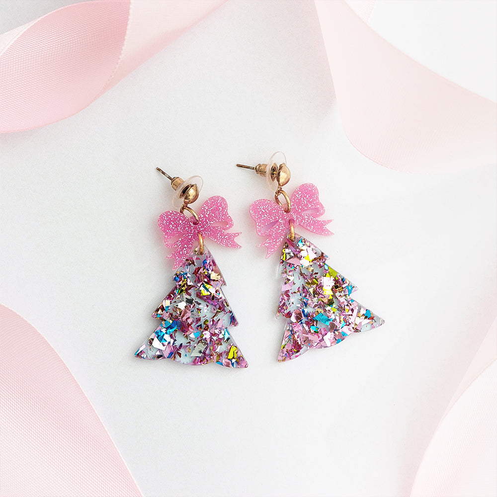 pink resin christmas trees with pink ribbon