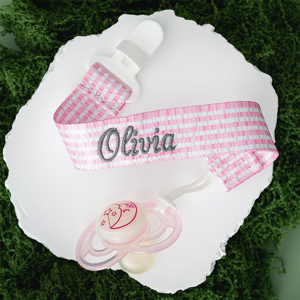 pink seersucker paci clip on moss
