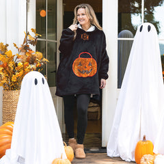 pumpkin blanket hoodie on emily with ghosts