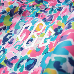 close up of monogrammed watercolor cheetah rain