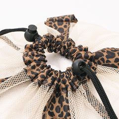 leopard monogrammed packable laundry bag close up of cinch