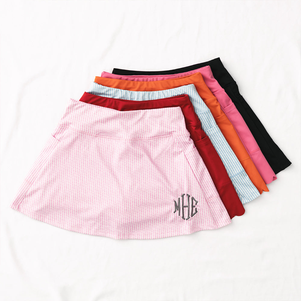 6 monogrammed skorts with pink seersucker