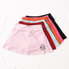 6 monogrammed skorts with pink seersucker