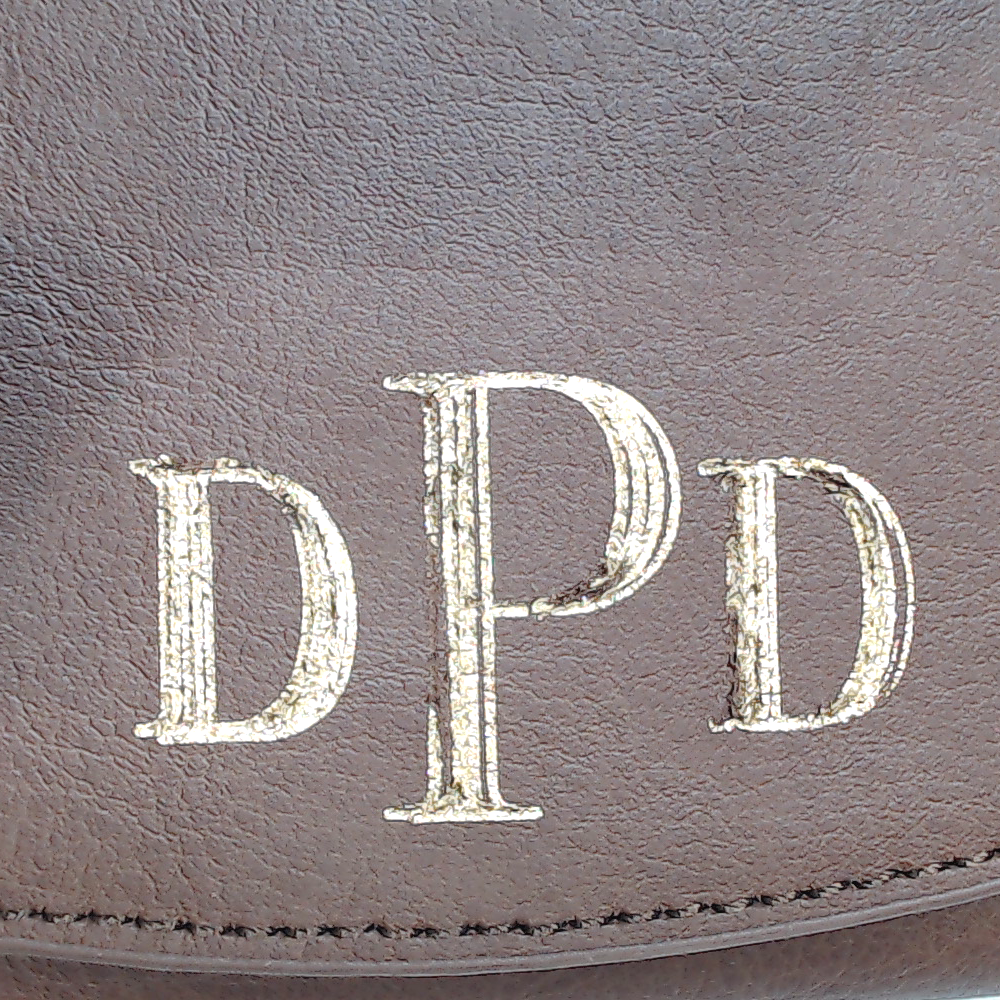 BLOOPER ACCESSORY: Monogrammed Leather Wallet