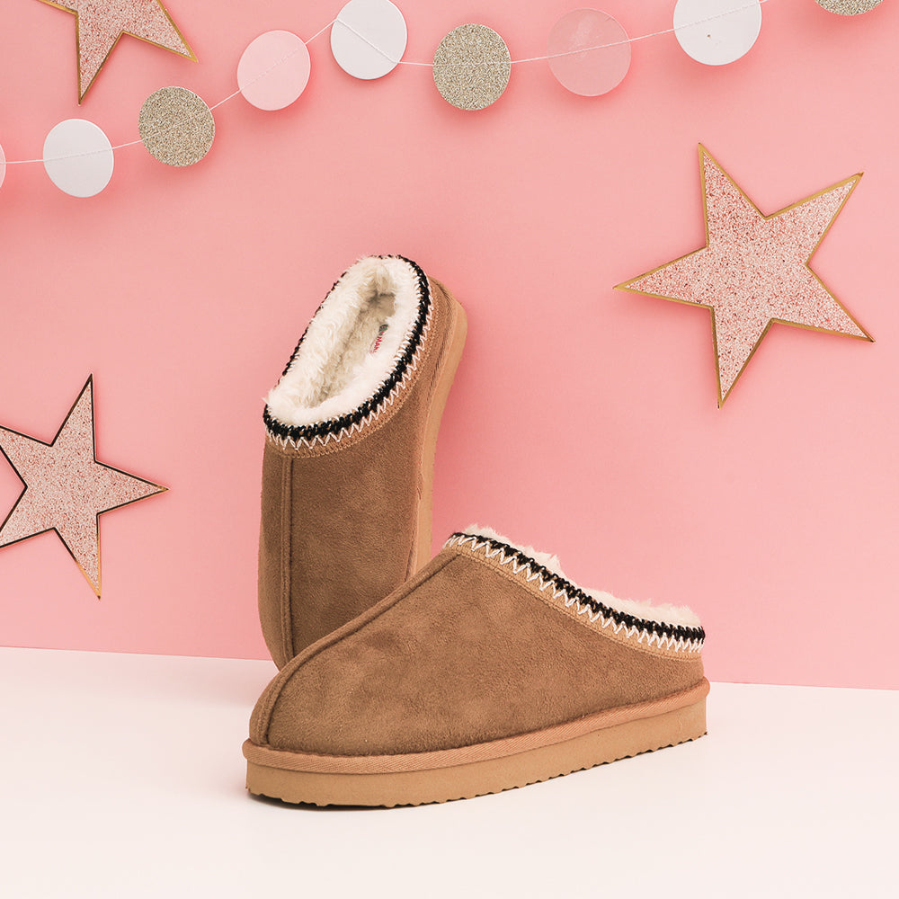 kids moccasins with pink background