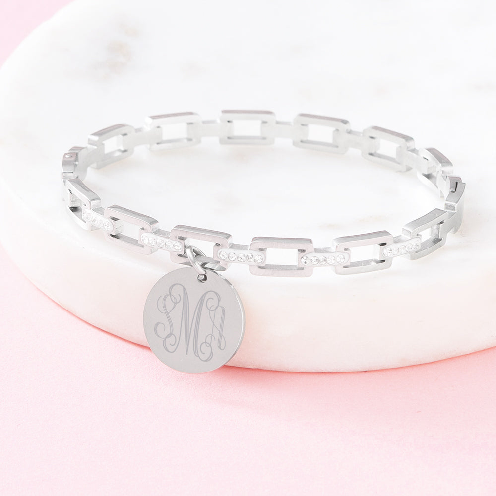 silver pave chainlink bangle on marble dish