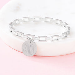 silver pave chainlink bangle on marble dish