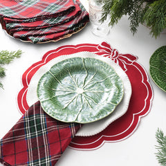 red bow scallop placemat with plates on top