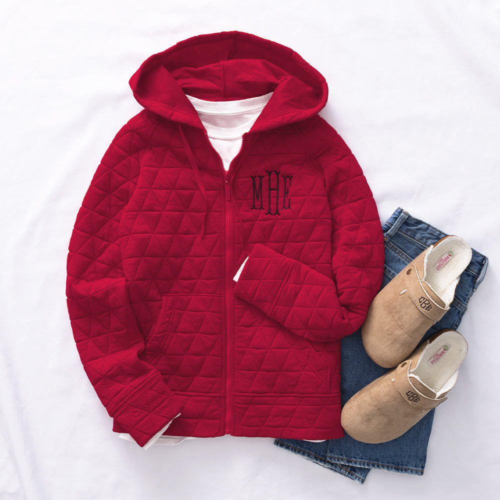 red quilted hoodie flatlay