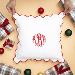 red scalloped pillow sham flatlay