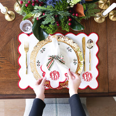 red scalloped placemat christmas setting above