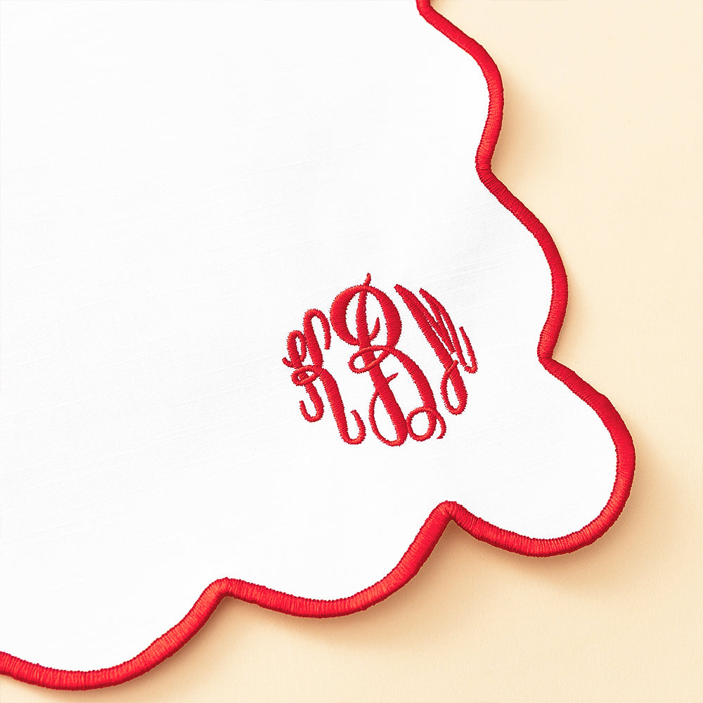 red scalloped placemat detail shot
