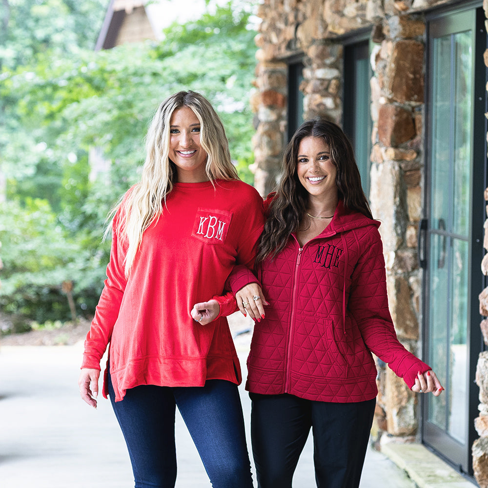 red softspun sweatshirt and quilted red jacket on girls