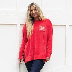 red softspun sweatshirt on woman