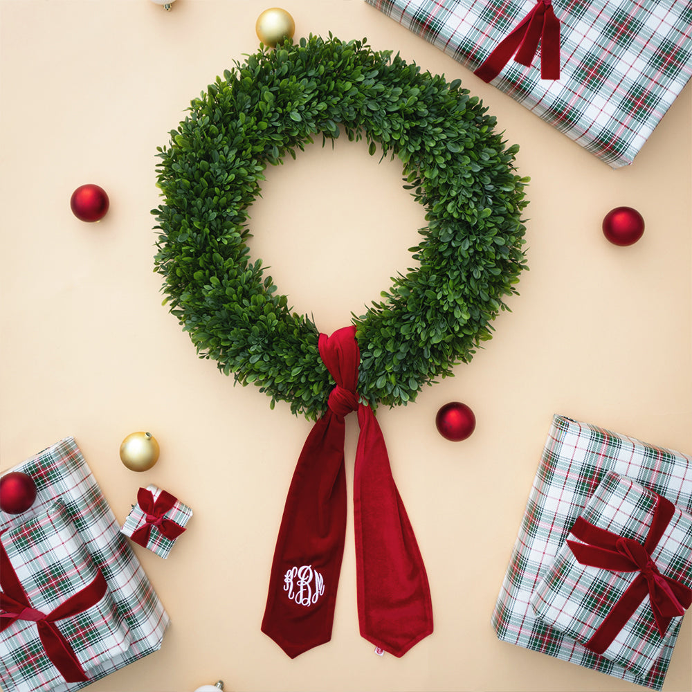red velvet wreath sash flatlay