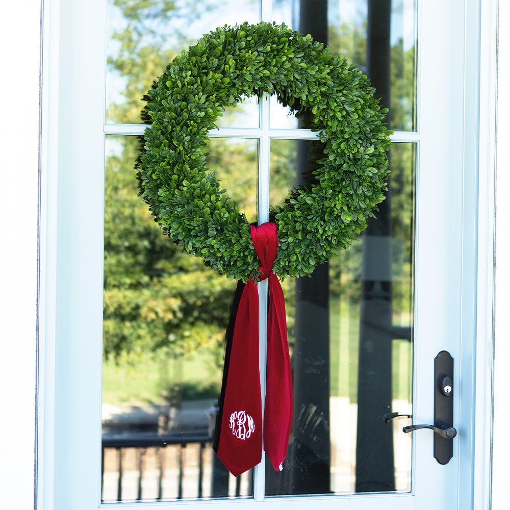 red velvet wreath sash on door