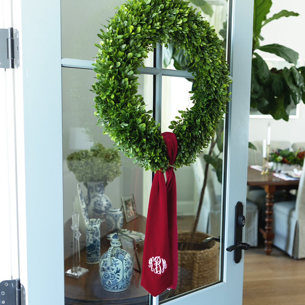 red velvet wreath sash on opened door