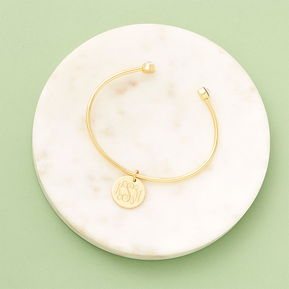 rhinestone cuff bangle on marble dish