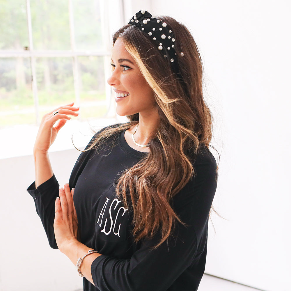 black and white pearl fashion headband on head
