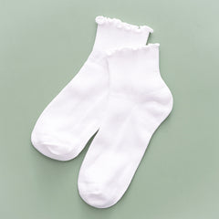 ruffle edge socks flat lay