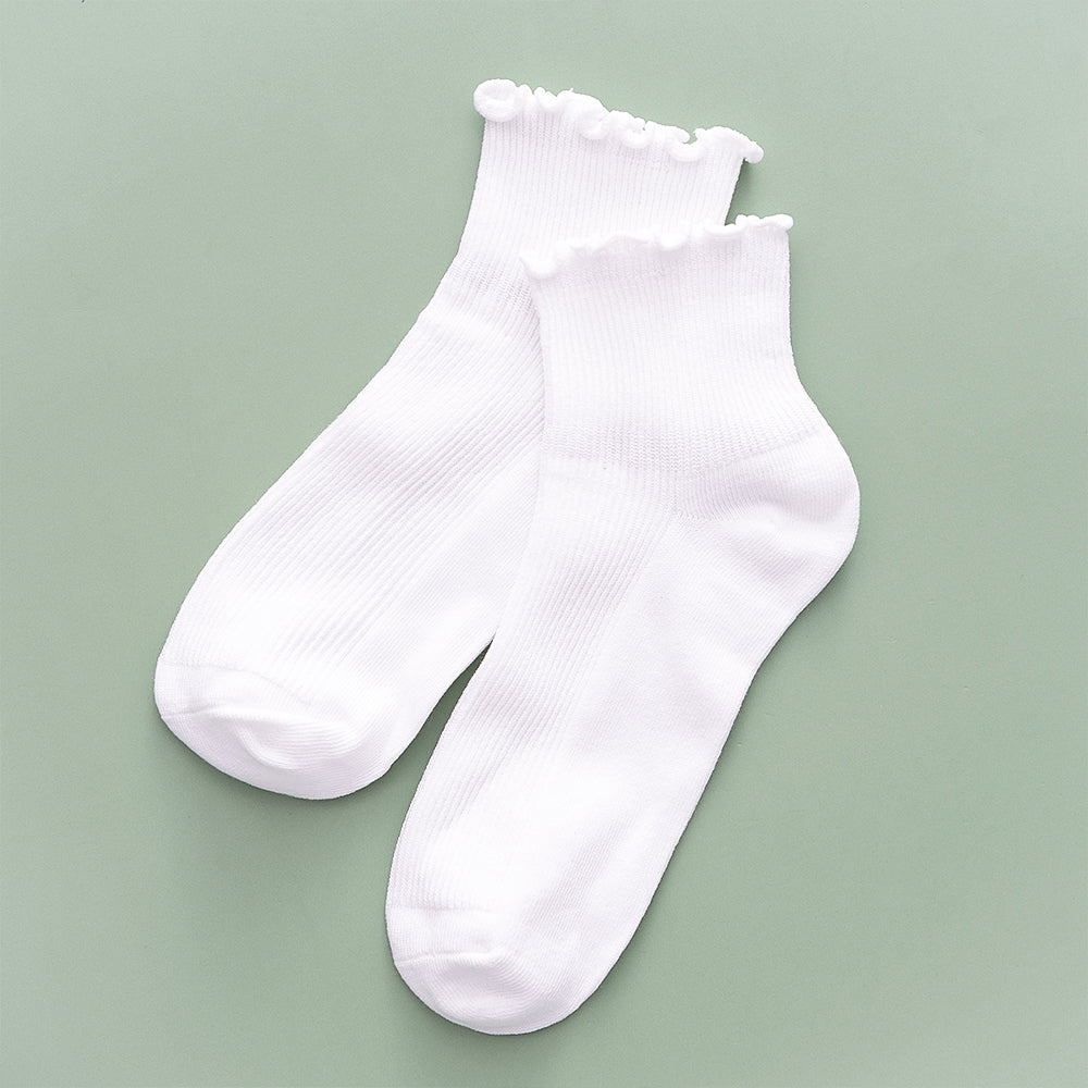 ruffle edge socks flat lay