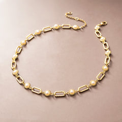 gold pearl starburst necklace studio shot
