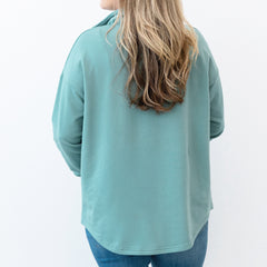 sage quarter zip sweatshirt on emily back view