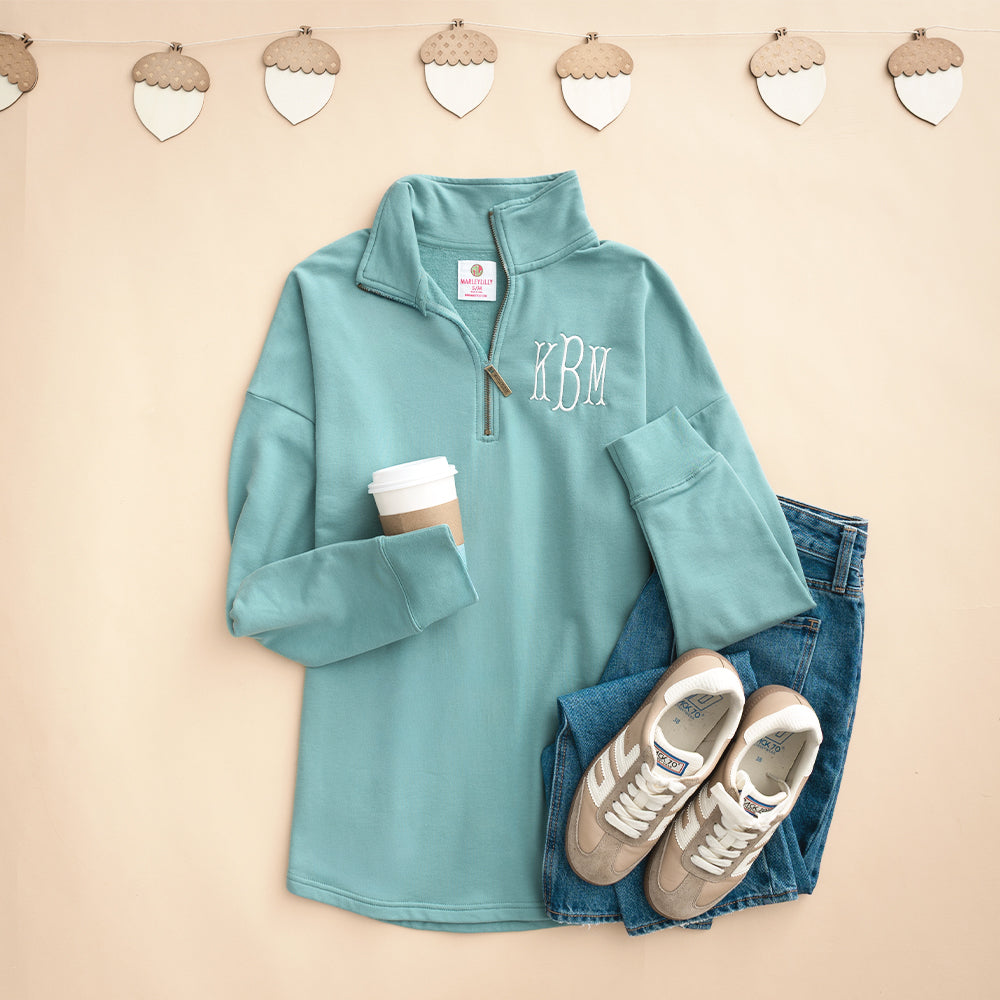 sage quarter zip sweatshirt flatlay