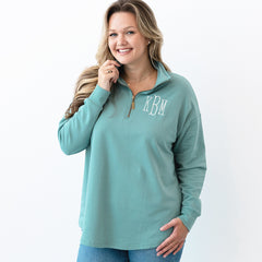 sage quarter zip sweatshirt on emily