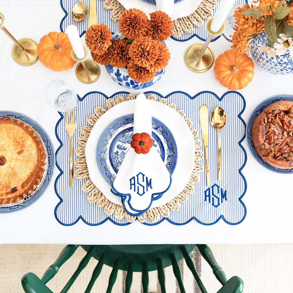 scalloped placemats and napkins in navy with fall decor