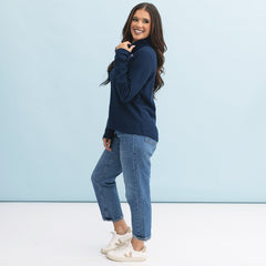 side of girl wearing monogrammed lightweight waffle quarter zip pullover in navy 