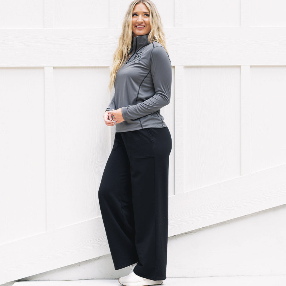 side of girl wearing personalized quarter zip pullover in grey 