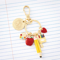 teacher bag charm keychain on paper