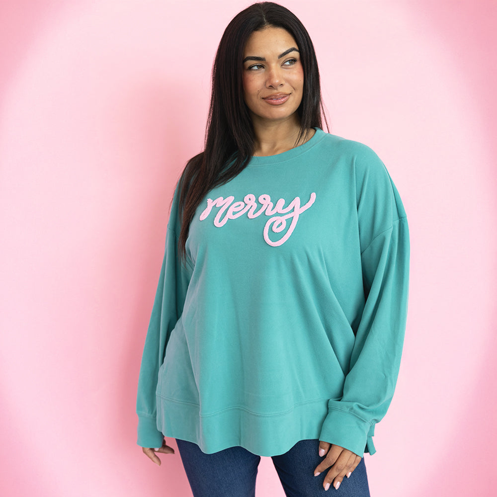 teal chenille merry sweatshirt on julia ann
