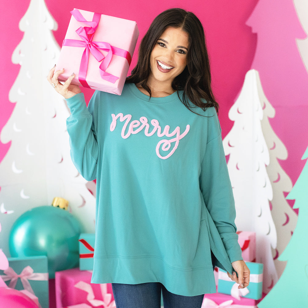 teal chenille merry sweatshirt on peyton