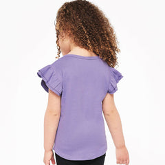Child wearing a purple ruffled shirt on a white background