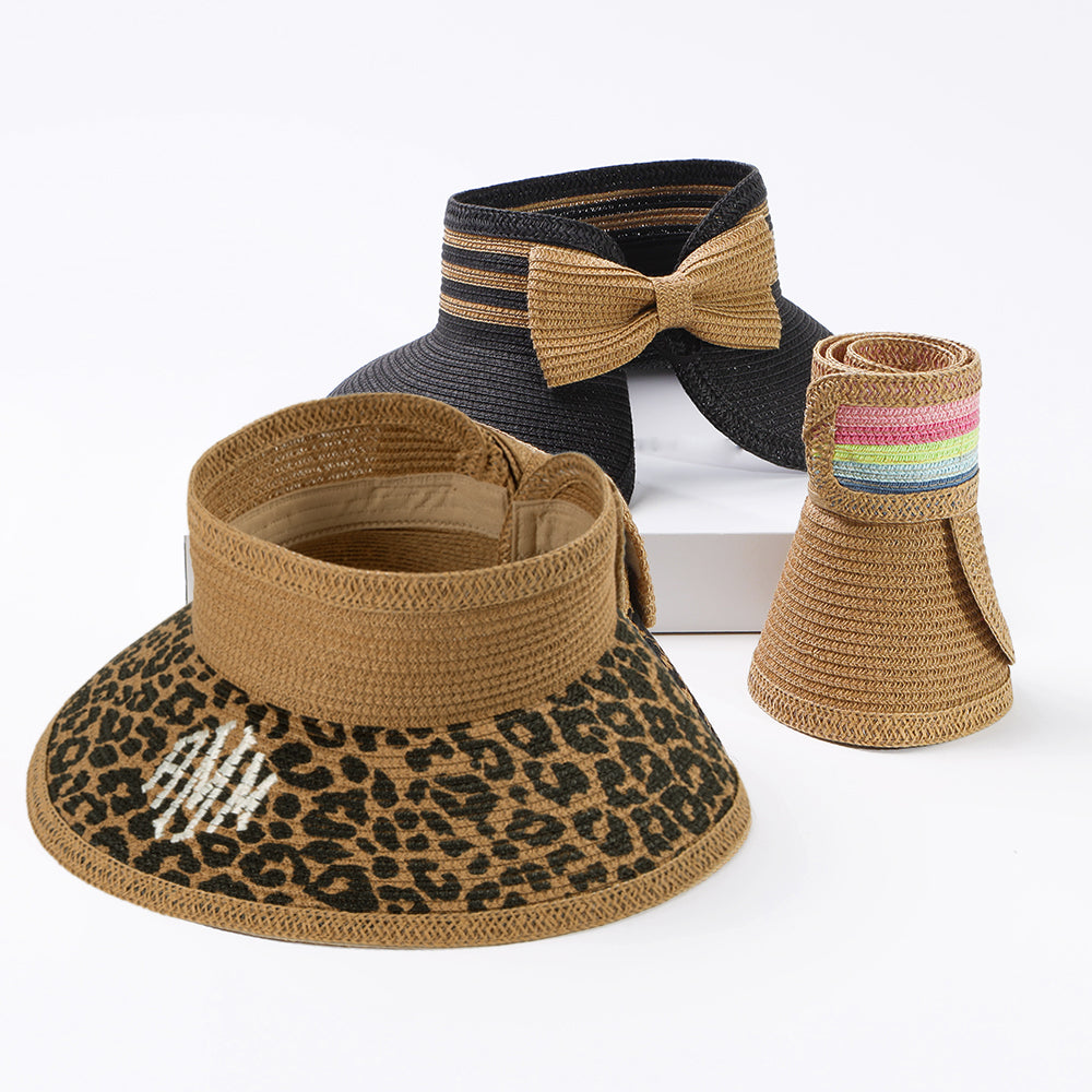 packable straw visor in tan leopard, black, and multi
