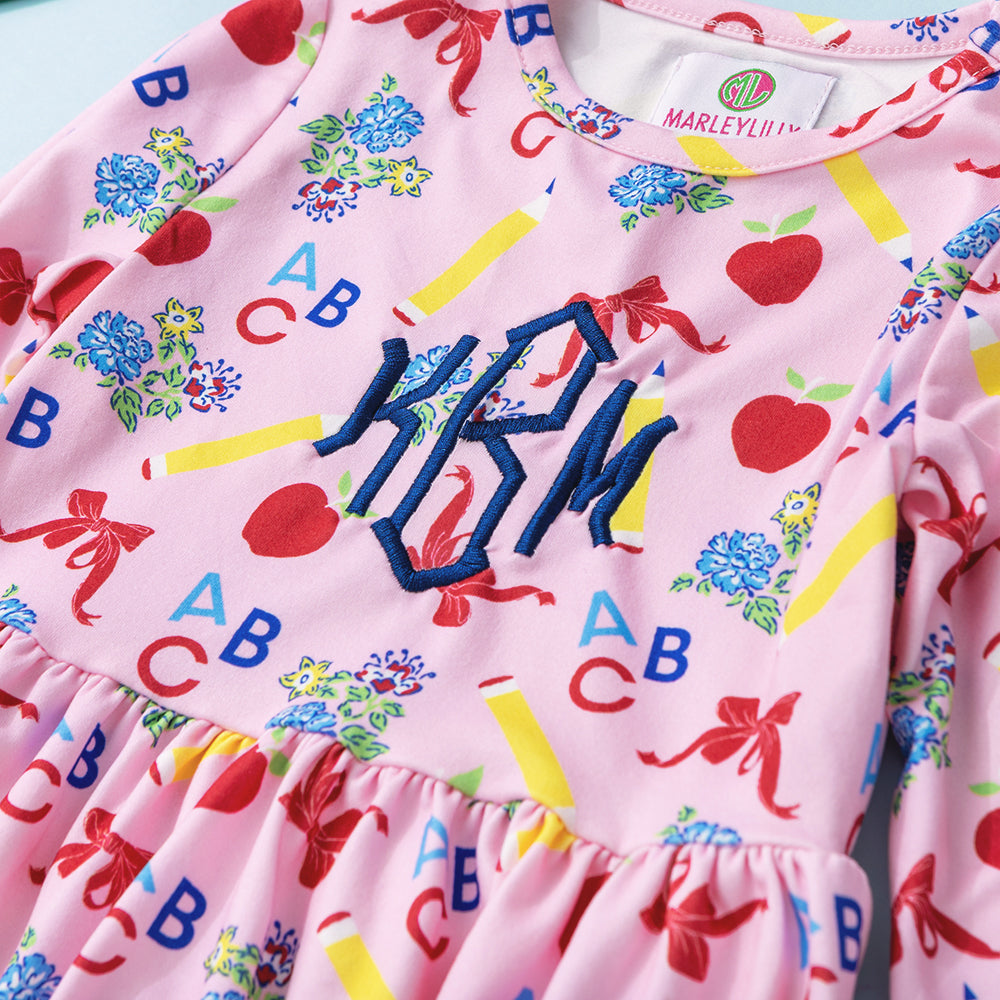up close of ABC blooms monogrammed girls twirl dress 