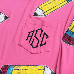 up close of monogrammed sequin teacher tee in hot pink 