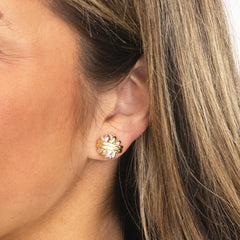silver gold wrapped cable stud earrings in ear