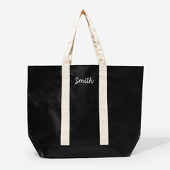 monogrammed waterproof tote in black sp26