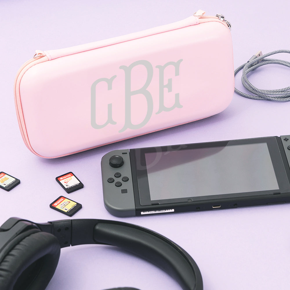 monogrammed pink game travel case with games and cord