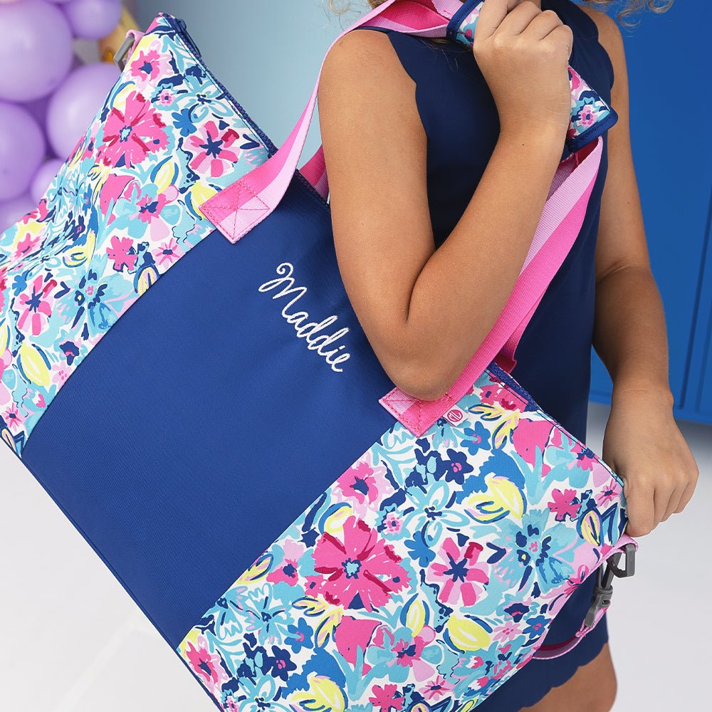 watercolor whimsy kids weekend bag on girls shoulder 