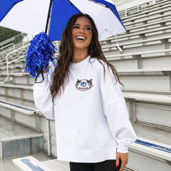 white bow football sweatshirt on peyton