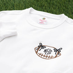 white bow football sweatshirt up close
