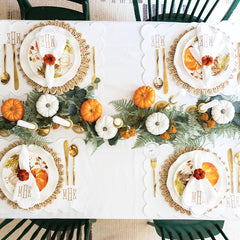 white scalloped napkins and placemats  table setting